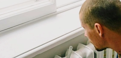 simple steps for bleeding a radiator, are you ready? what's he looking at? has he lost his key?